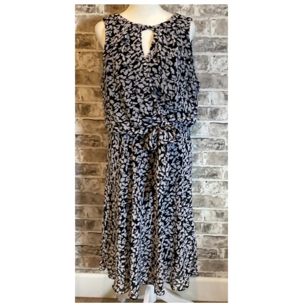 Karin Steven’s sleeveless black/white patterned lined dress. Tie at neck & waist